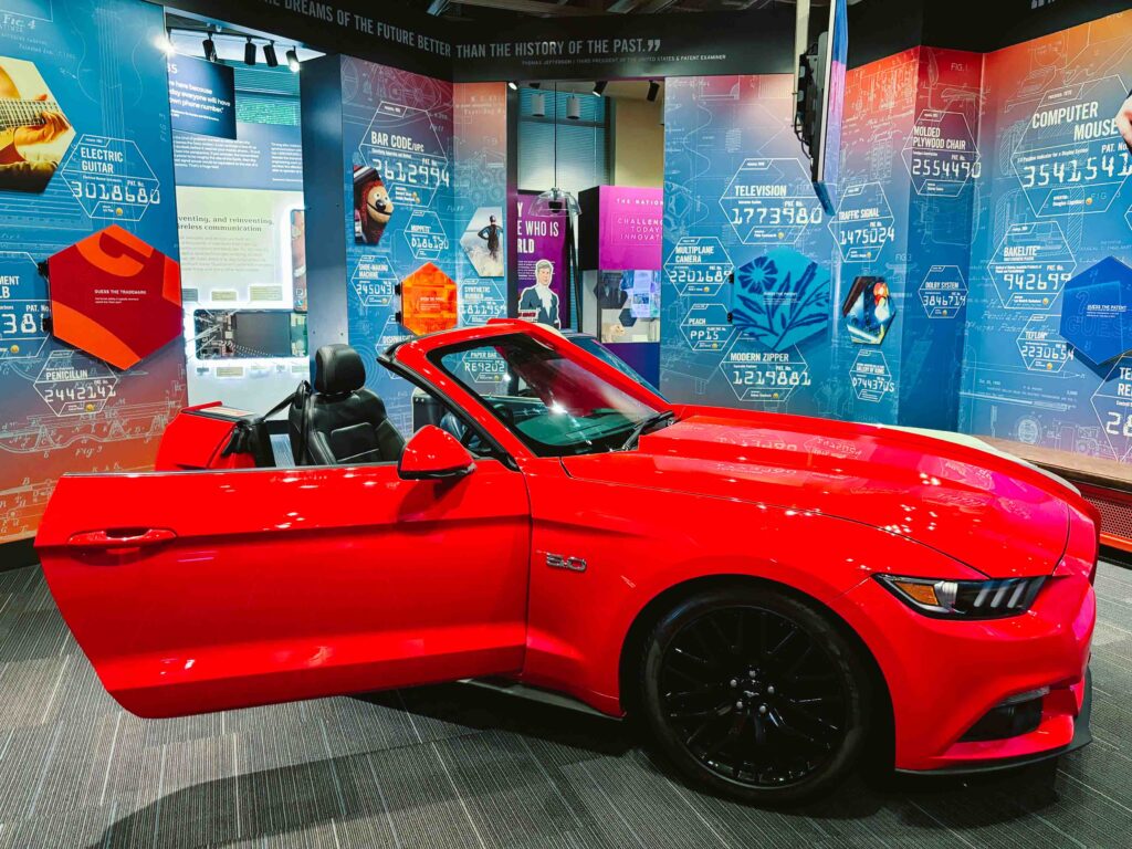 Exhibit at the National Inventors Hall of Fame with a red car with the back cut off